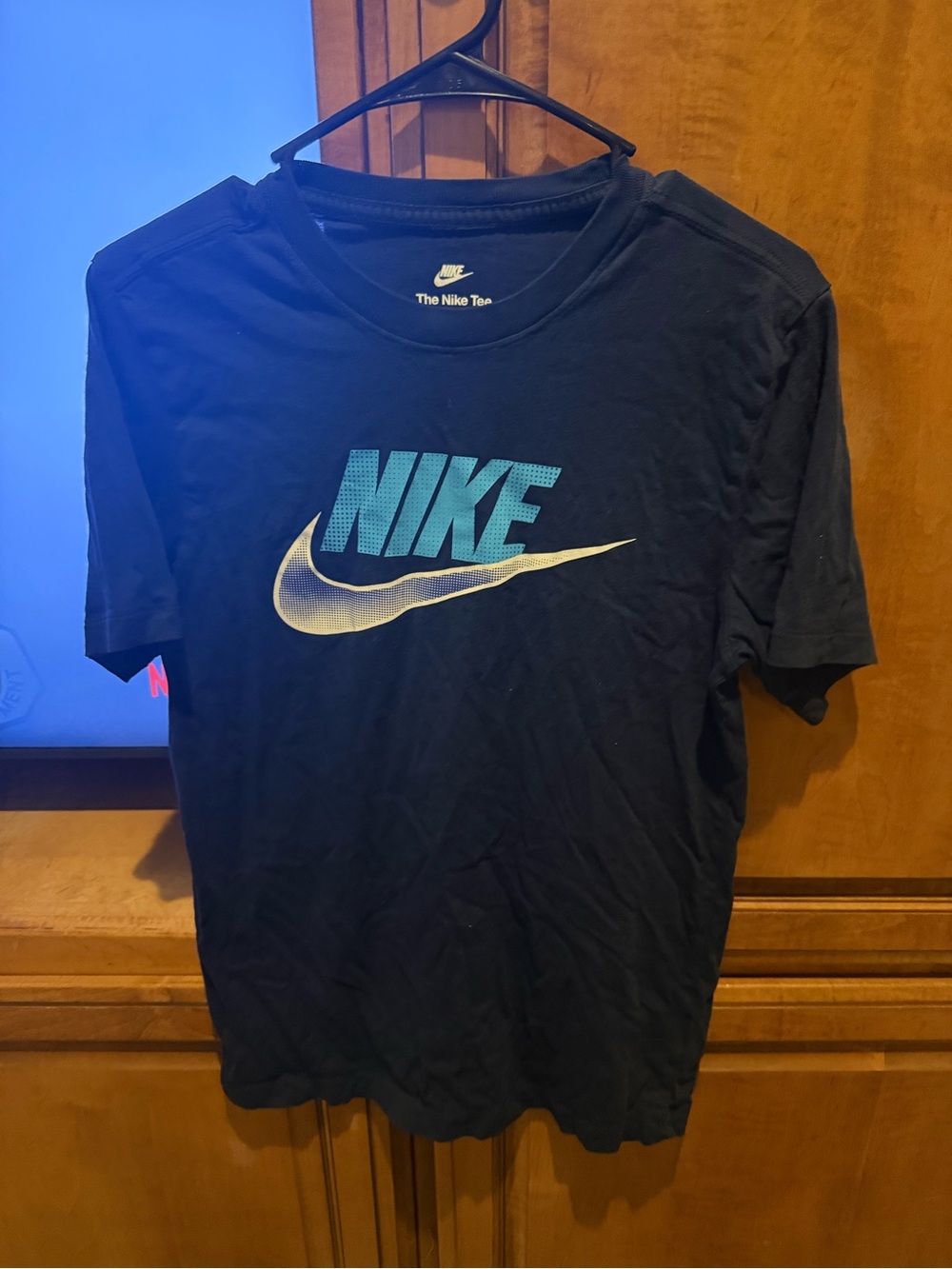 Nike Black Short Sleeve Tee with Blue Logo and White Swoosh